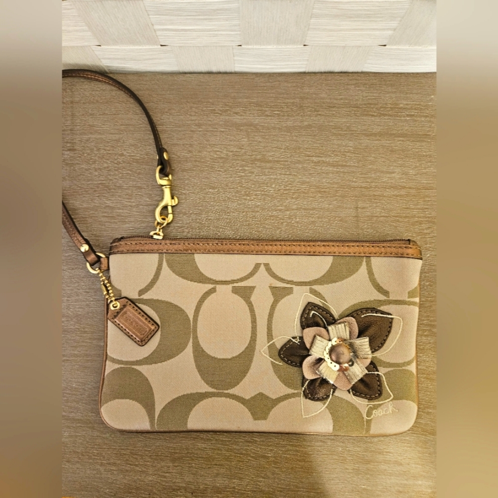 Coach large wristlet with floral applique